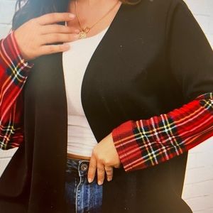 Black cardigan with tartan plaid on sleeve